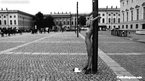 Naked and chained to a lamp post